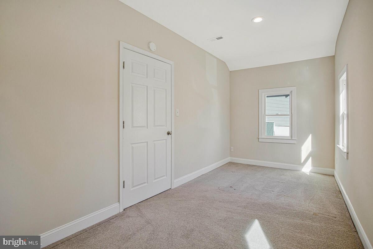 1916 Ridgeville Road Edgewater, MD 21037 - Photo 16 of 27 a view of an empty room with a window