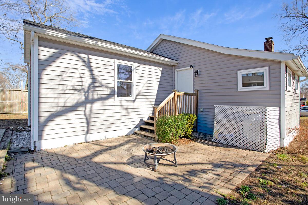 1916 Ridgeville Road Edgewater, MD 21037 - Photo 17 of 27 a front view of a house with a yard
