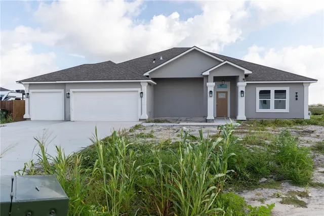front view of house with a yard