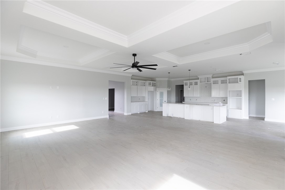702 Mama Fefi Drive Corpus Christi, TX 78414 - Photo 6 of 10 a view of a big room with closet and windows