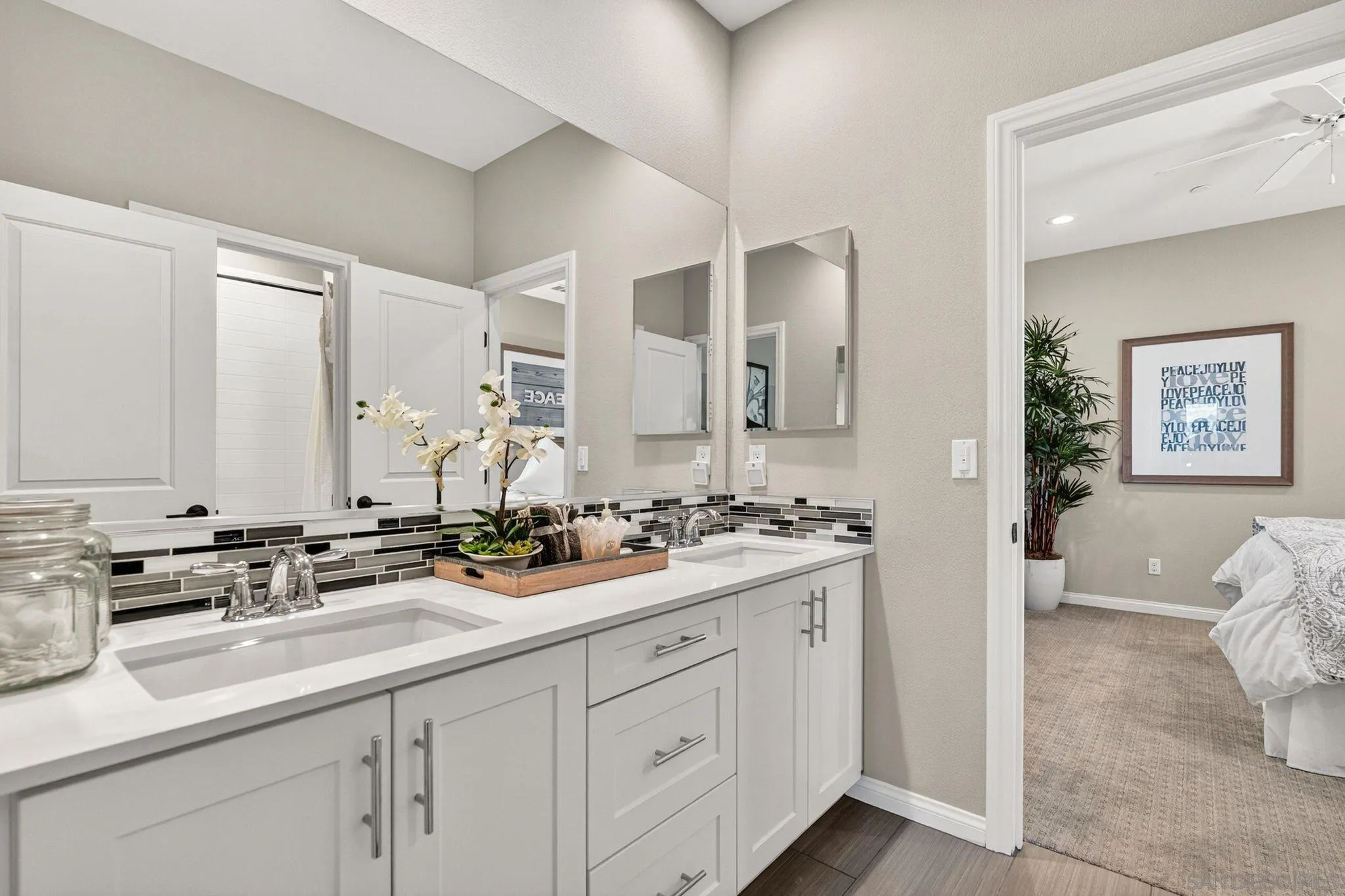 21509 Wilgen Road Escondido, CA 92029 - Photo 29 of 37 a en suite bathroom with double sink and a mirror