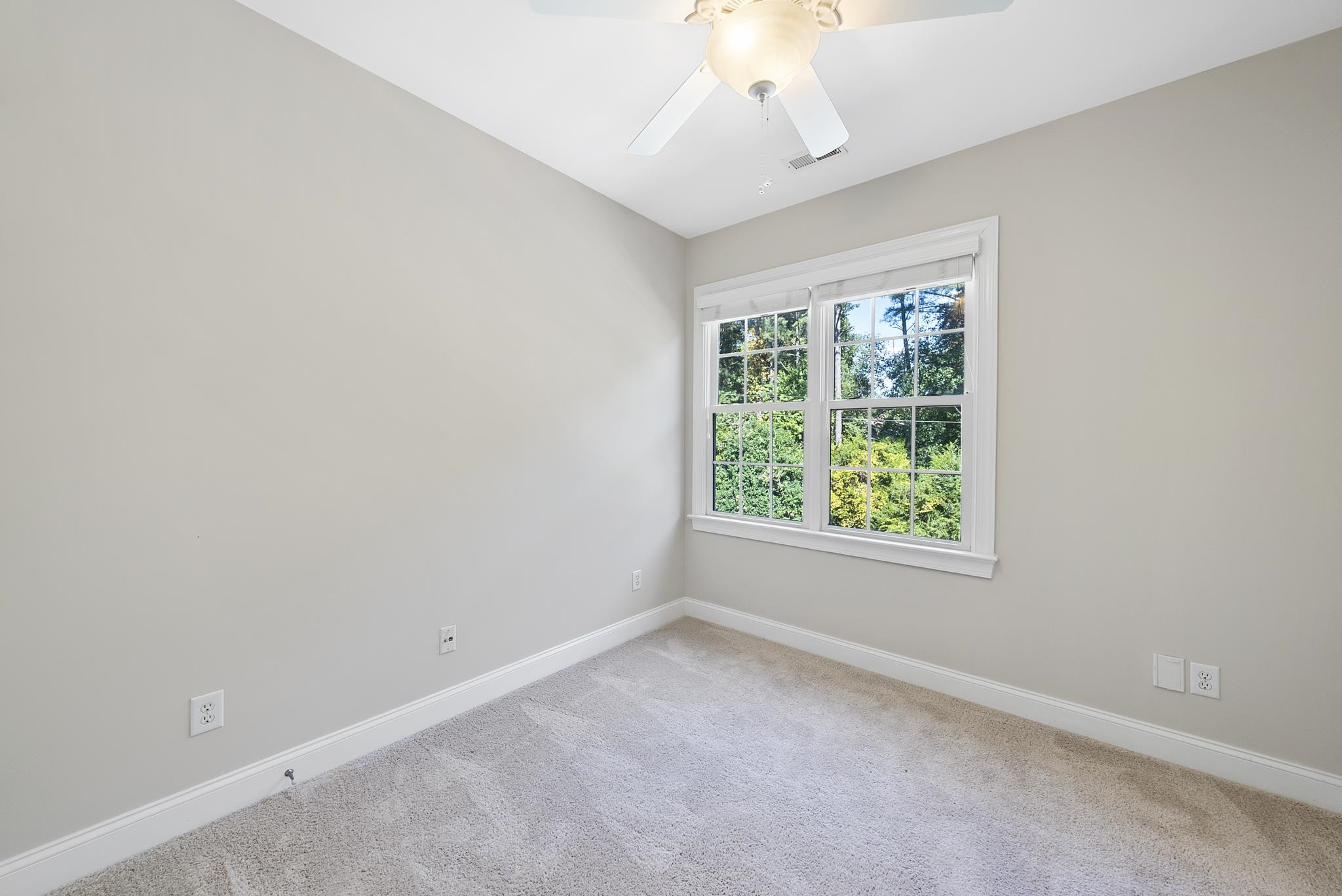 7357 Newport Avenue Raleigh, NC 27613 - Photo 23 of 44 an empty room with a window