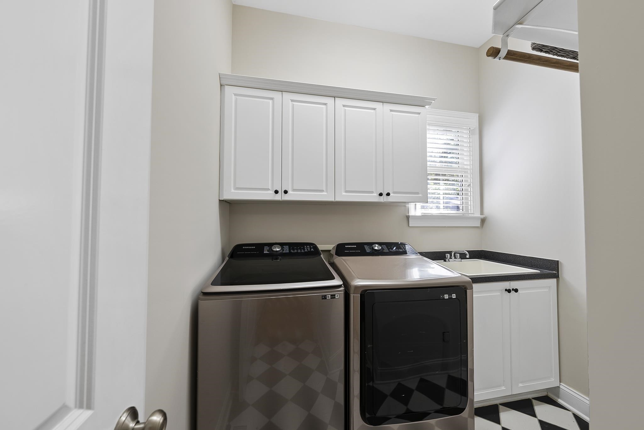 7357 Newport Avenue Raleigh, NC 27613 - Photo 27 of 44 a room with storage and utility