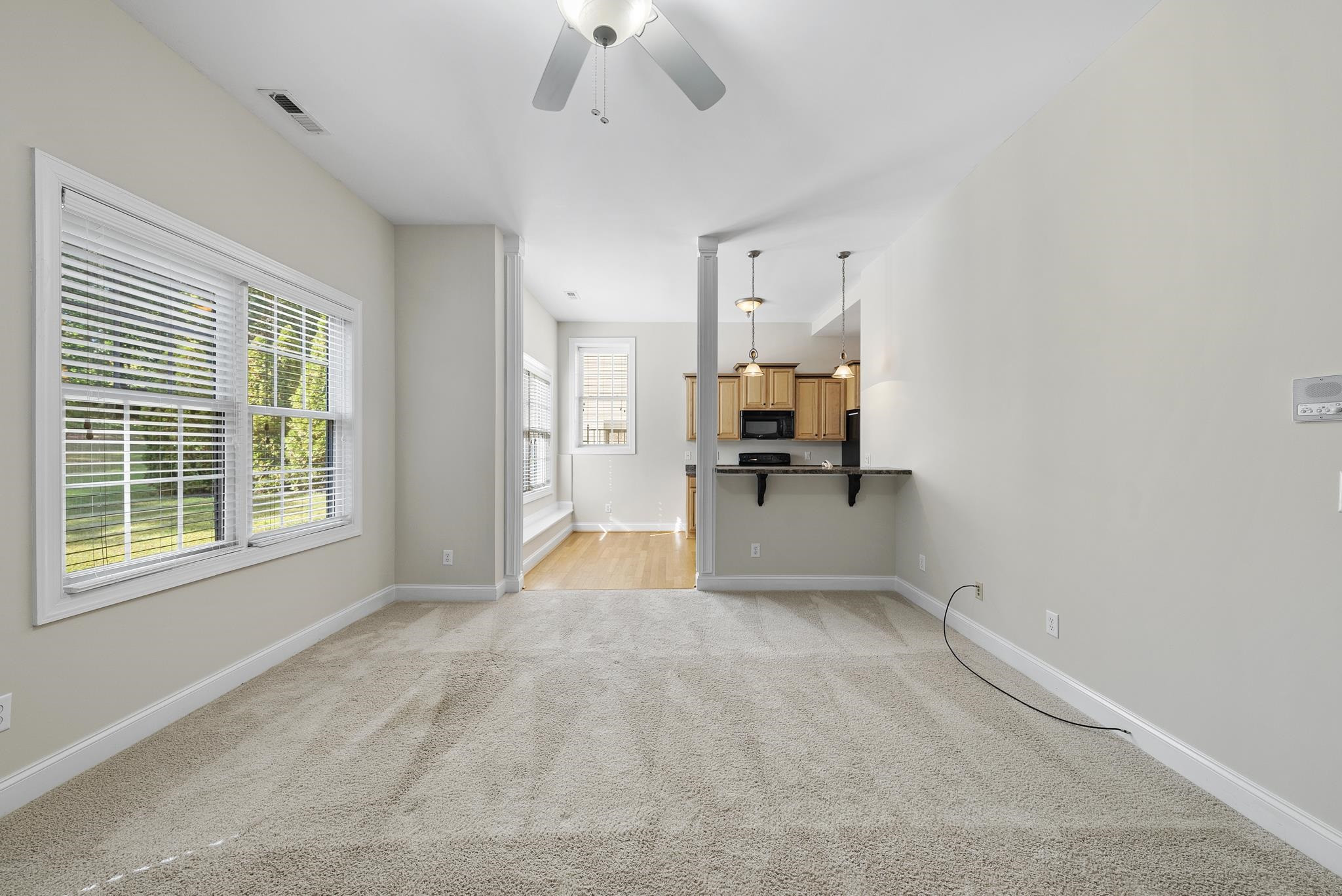 7357 Newport Avenue Raleigh, NC 27613 - Photo 33 of 44 a view of empty room with a kitchen