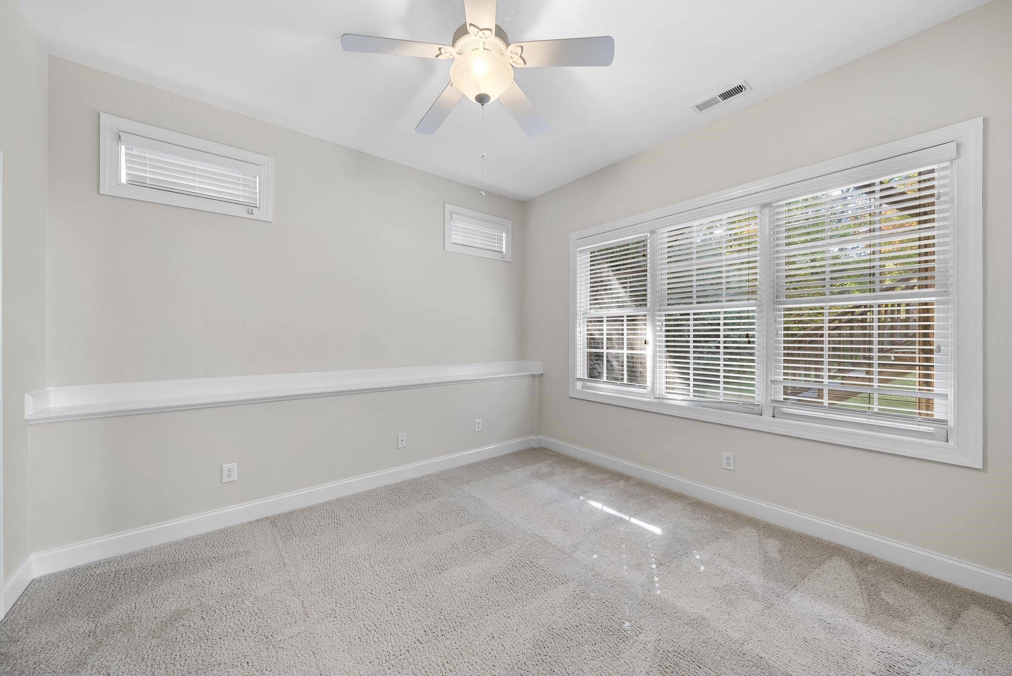 7357 Newport Avenue Raleigh, NC 27613 - Photo 38 of 44 a view of an empty room with a window