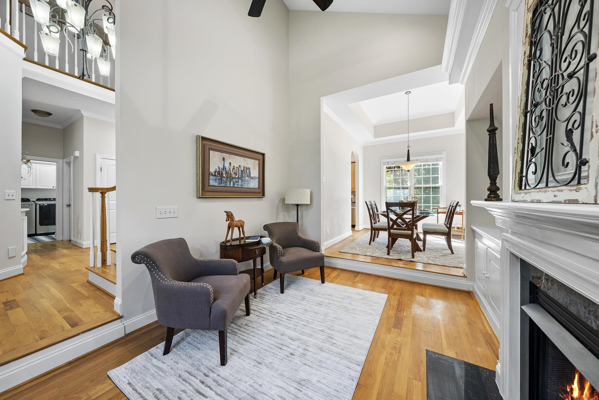 7357 Newport Avenue Raleigh, NC 27613 - Photo 4 of 44 a living room with furniture and a fireplace