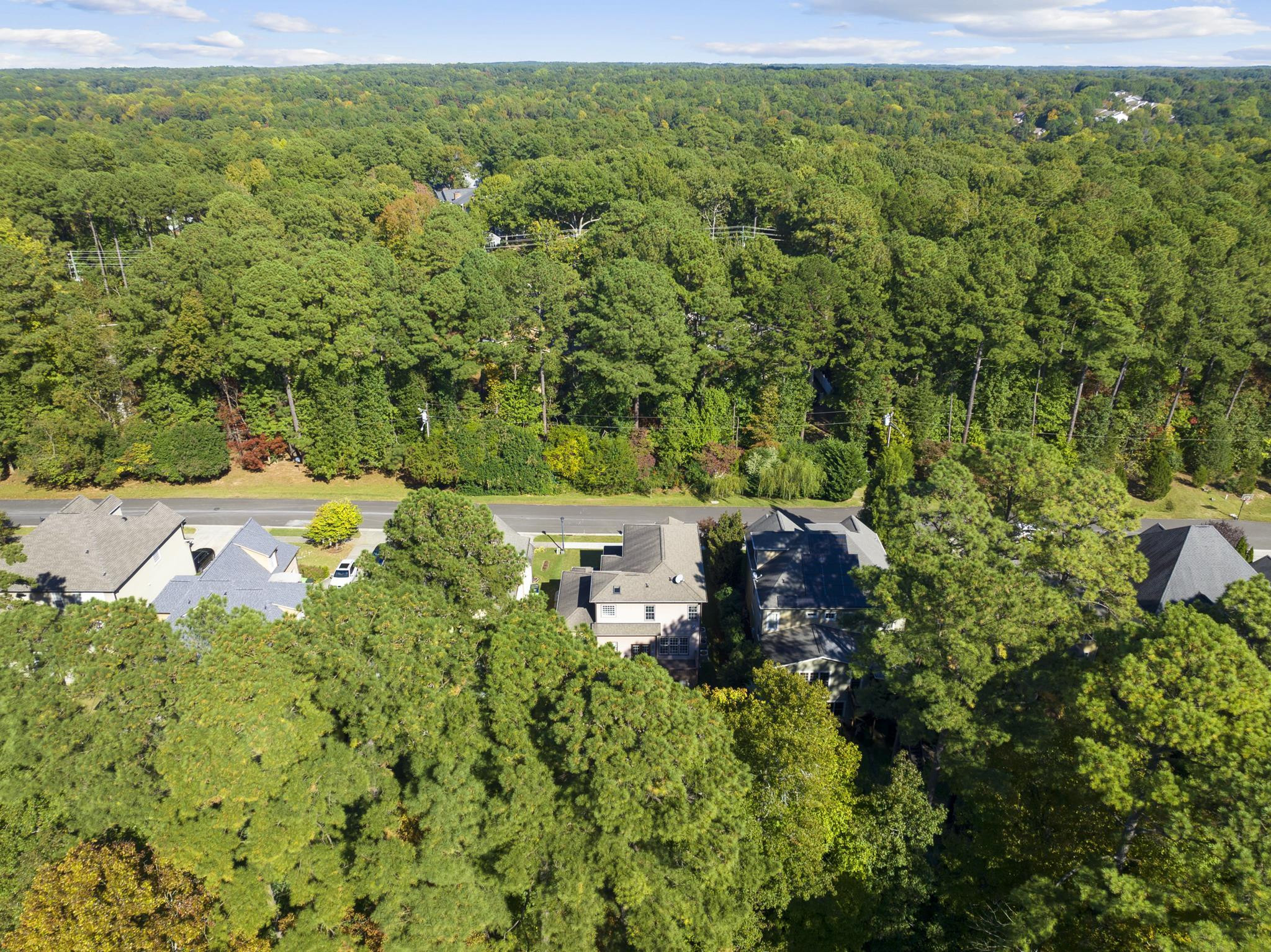 7357 Newport Avenue Raleigh, NC 27613 - Photo 44 of 44 an aerial view of a house with a yard