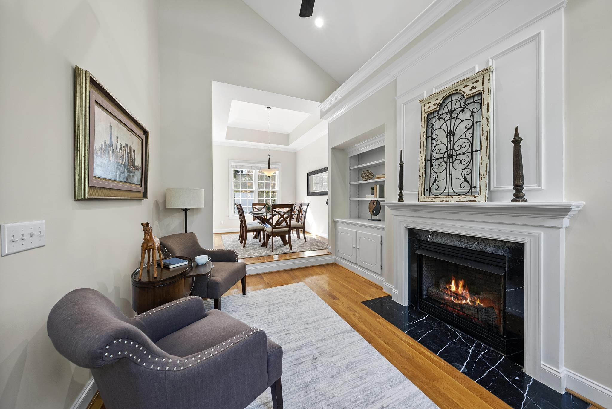 7357 Newport Avenue Raleigh, NC 27613 - Photo 5 of 44 a living room with furniture and a fireplace