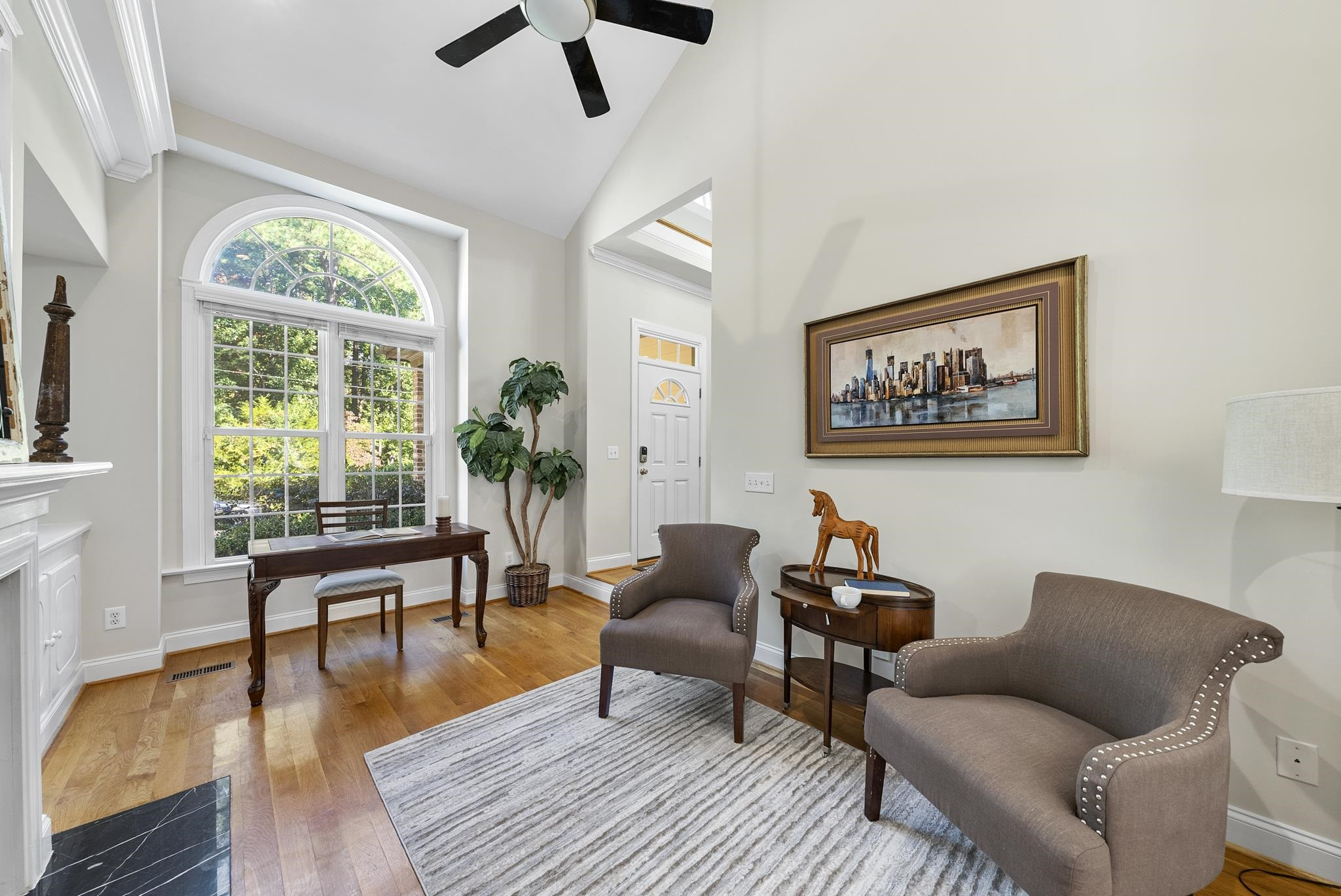 7357 Newport Avenue Raleigh, NC 27613 - Photo 6 of 44 a living room with furniture and a wooden floor