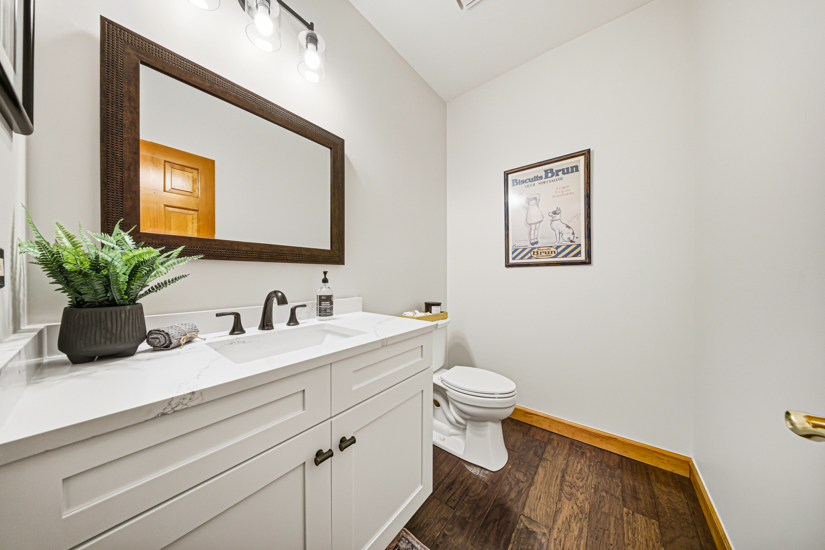 6N679 Colonel Bennett Lane St. Charles, IL 60175 - Photo 11 of 38 a bathroom with a toilet a sink and mirror