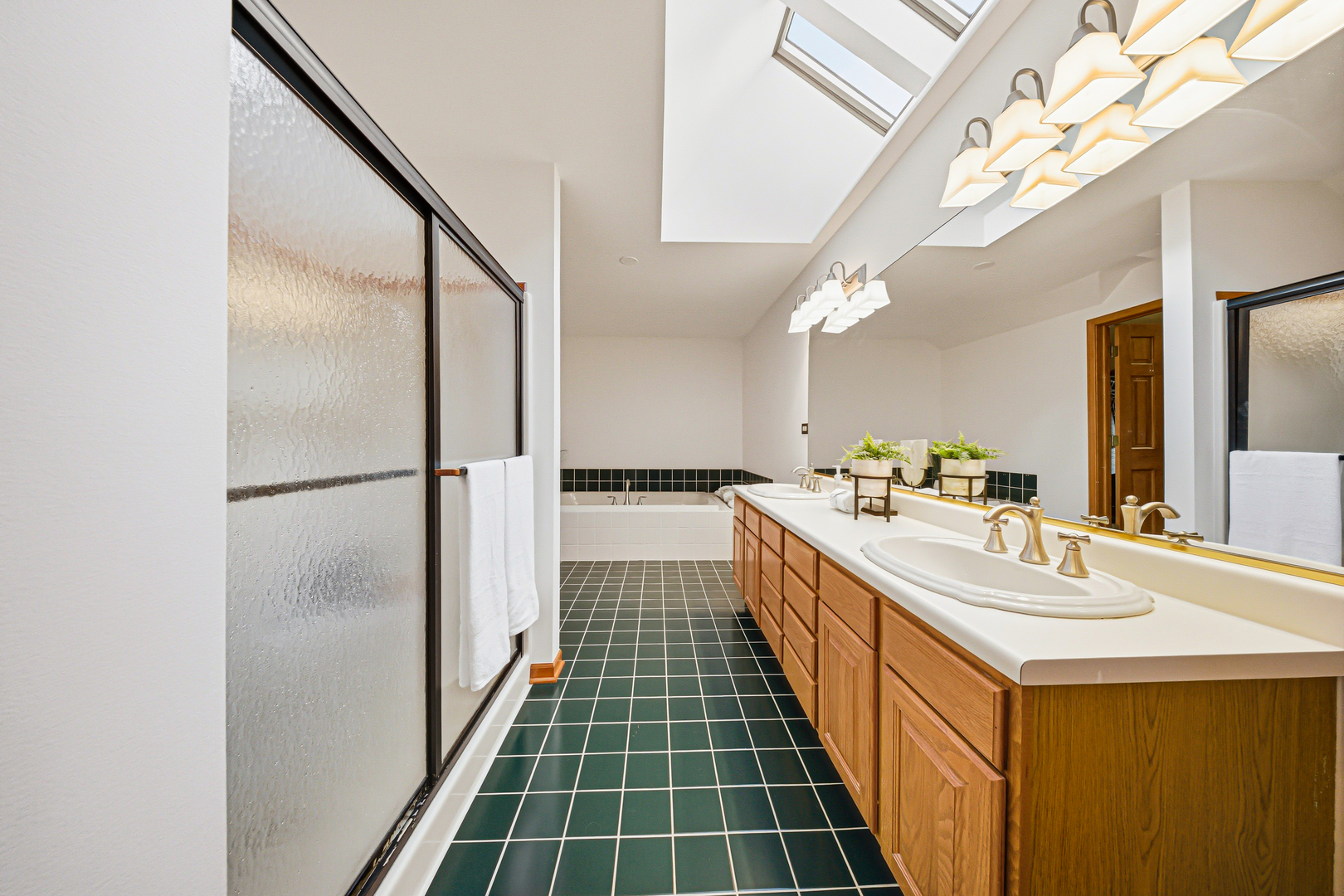 6N679 Colonel Bennett Lane St. Charles, IL 60175 - Photo 14 of 38 a kitchen with kitchen island a counter top space and a sink