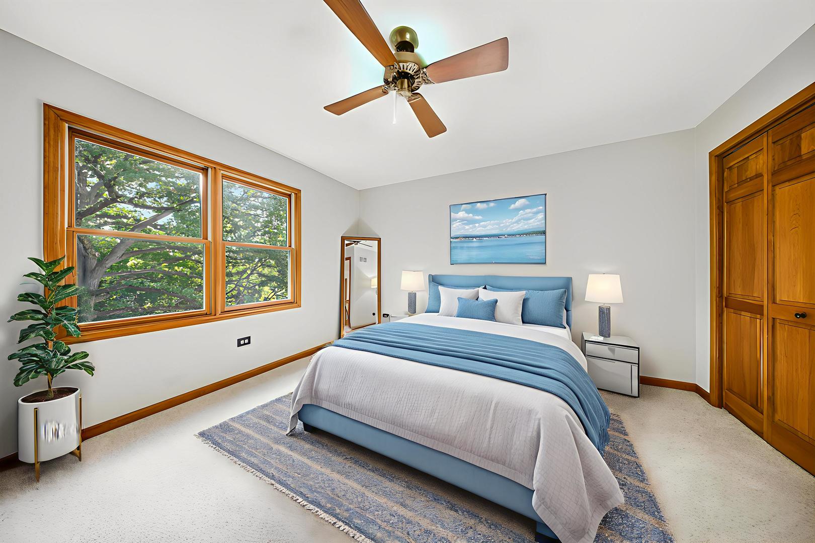 6N679 Colonel Bennett Lane St. Charles, IL 60175 - Photo 16 of 38 a bedroom with a large bed and a large window