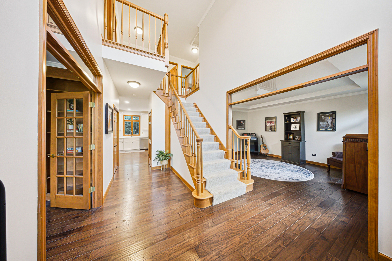 6N679 Colonel Bennett Lane St. Charles, IL 60175 - Photo 2 of 38 a view of entryway livingroom and hall with wooden floor