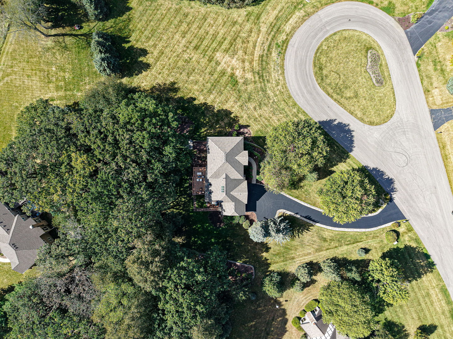 6N679 Colonel Bennett Lane St. Charles, IL 60175 - Photo 21 of 38 an aerial view of a house with a yard and swimming pool