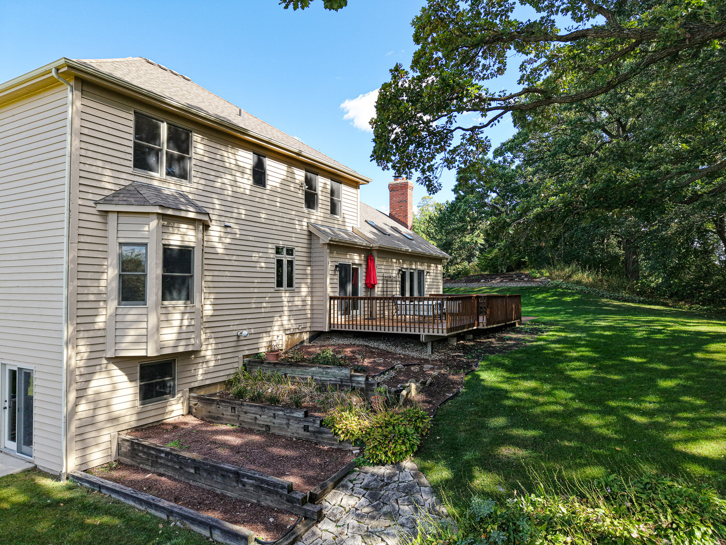 6N679 Colonel Bennett Lane St. Charles, IL 60175 - Photo 23 of 38 a view of a house with backyard and sitting area