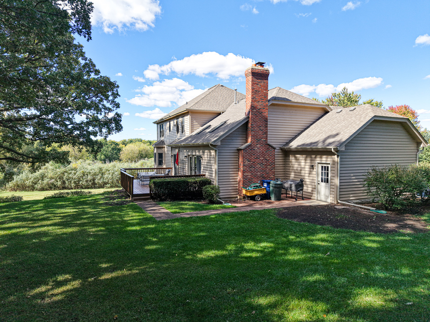 6N679 Colonel Bennett Lane St. Charles, IL 60175 - Photo 25 of 38 a view of a house with a yard porch and sitting area