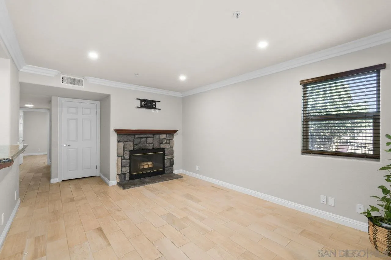 1434 Marshall Road, Unit 18 Alpine, CA 91901 - Photo 11 of 25 a view of an empty room with a fireplace