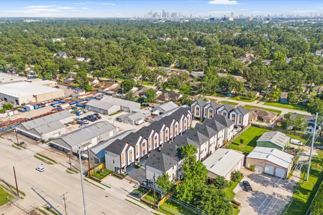 an aerial view of residential building with parking space