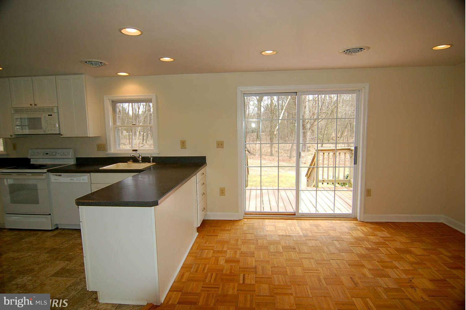 113 Primrose Road Chestertown, MD 21620 - Photo 5 of 11 Kitchen dining area leading to deck