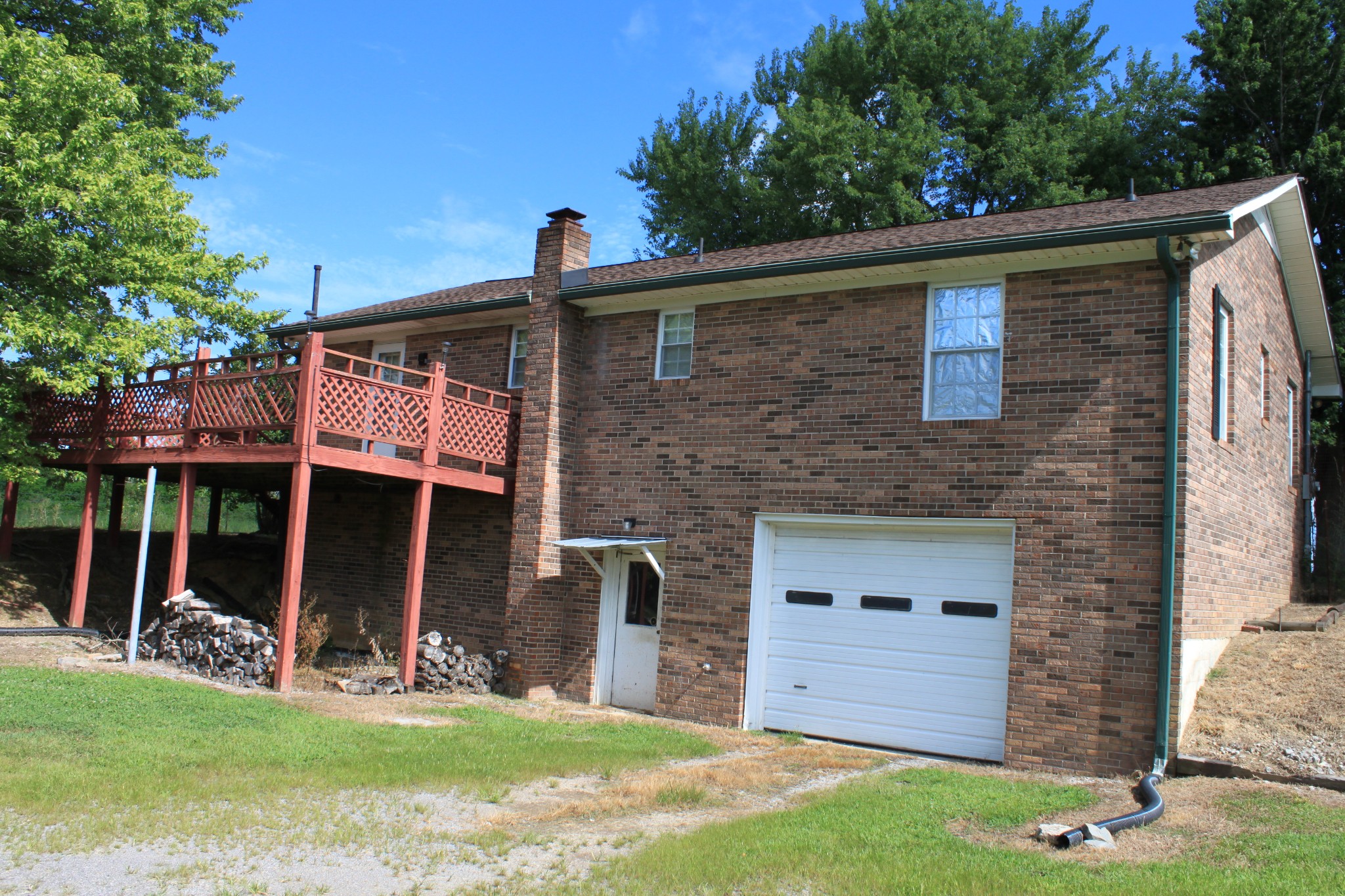 6923 Old Mill Hill Road Dowelltown, TN 37059 - Photo 2 of 43 front view of house with a yard