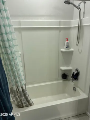 a bathroom with a bathtub