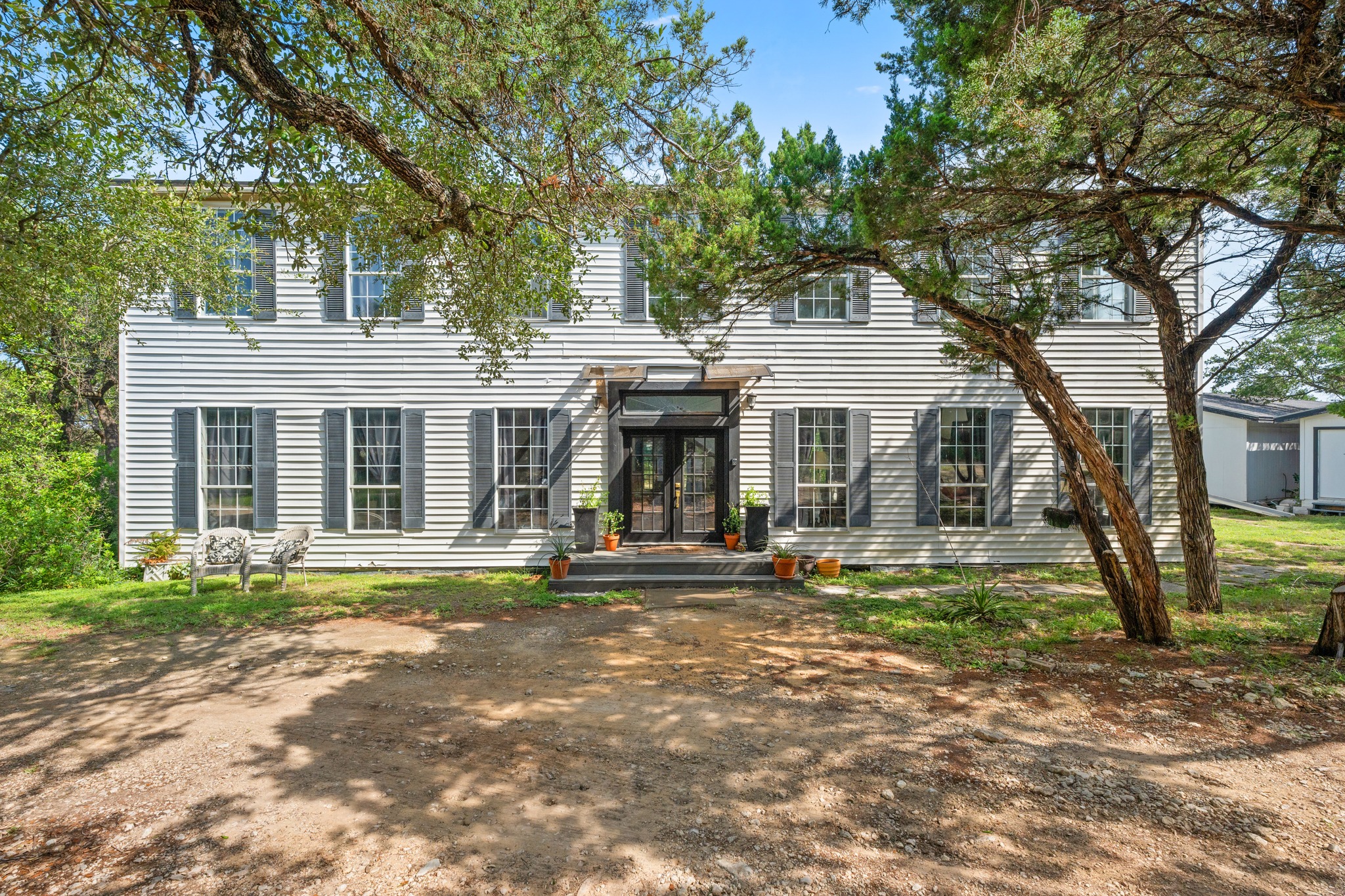 12932 Nutty Brown Road Austin, TX 78737 - Photo 38 of 40 White House - Positioned on one of the property’s most private sites, The White House offers exceptional flexibility and future potential.