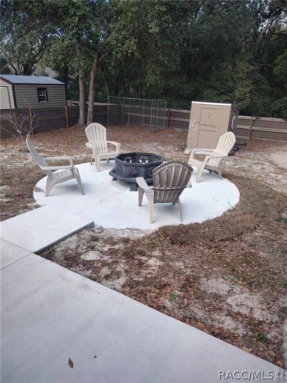 13591 Southwest 112th Street Dunnellon, FL 34432 - Photo 23 of 24 a view of a backyard with sitting area