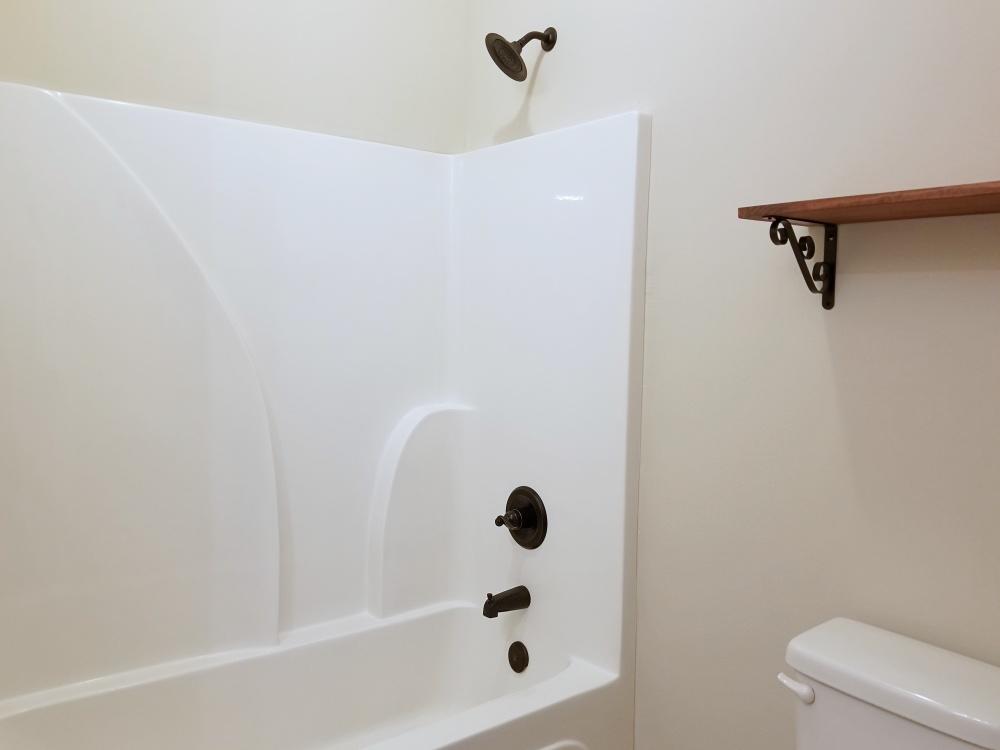 5618 Price Plantation Road Baker, FL 32531 - Photo 13 of 24 a bathroom with a shower