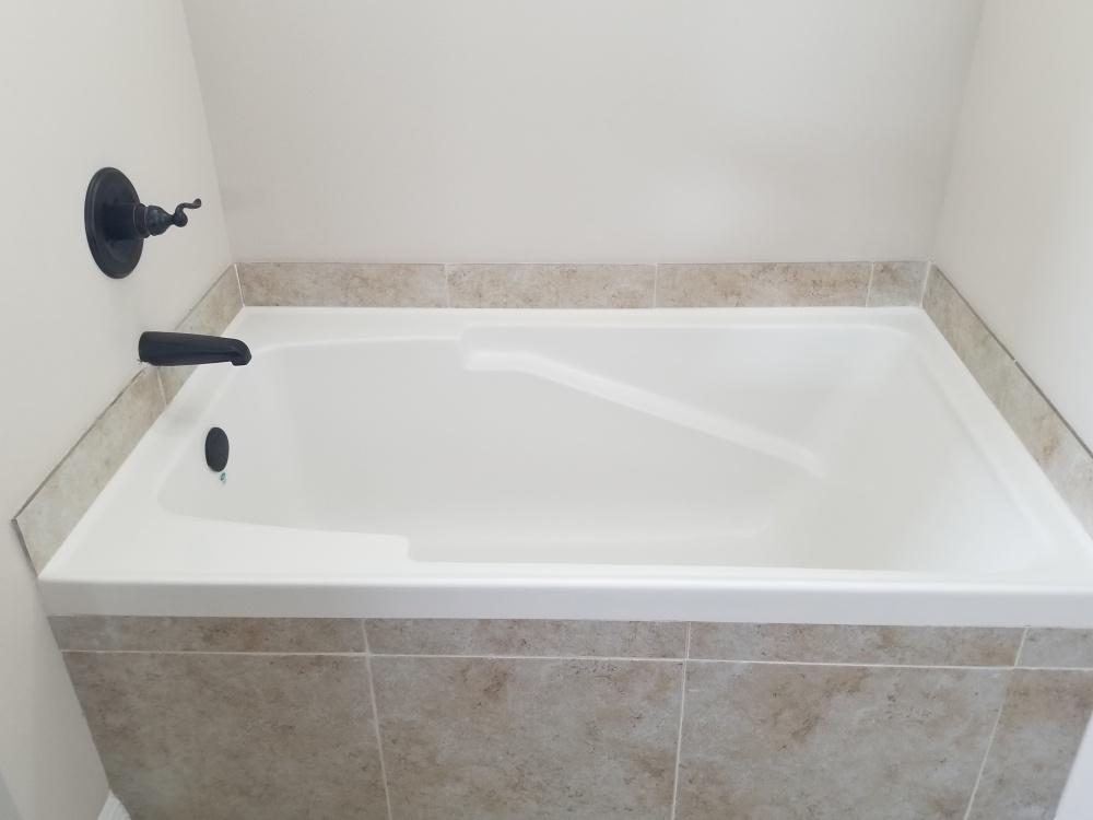5618 Price Plantation Road Baker, FL 32531 - Photo 19 of 24 a bathroom with a shower