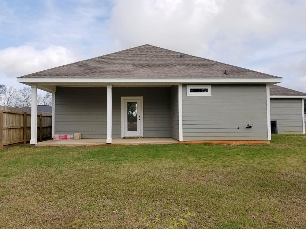 5618 Price Plantation Road Baker, FL 32531 - Photo 22 of 24 a house that has a big yard in front of it