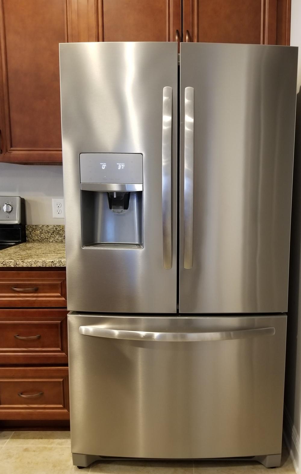 5618 Price Plantation Road Baker, FL 32531 - Photo 9 of 24 a view of a refrigerator in kitchen