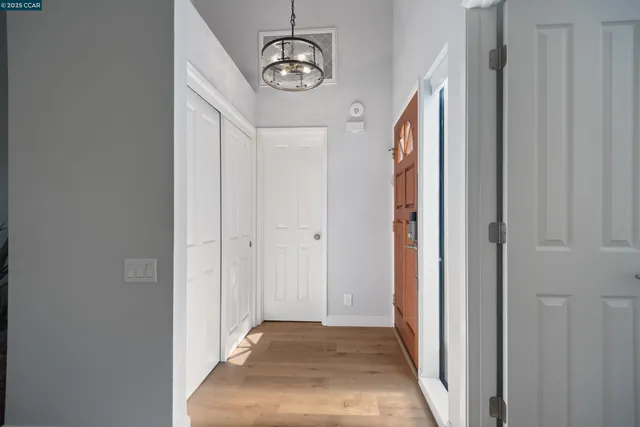 a view of a hallway to a bedroom