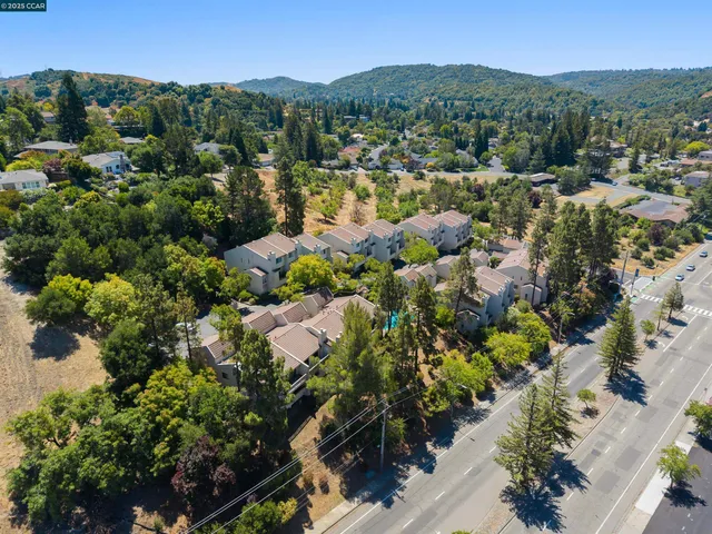 an aerial view of a town with couple of houses