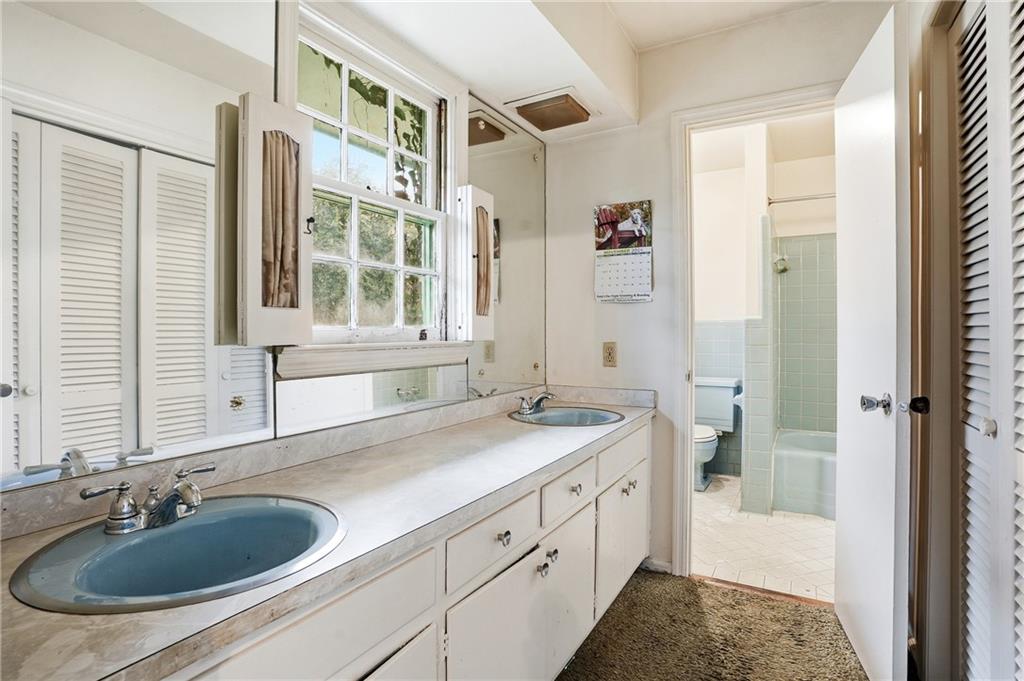 2935 Heather Drive East Point, GA 30344 - Photo 13 of 25 a bathroom with a sink and a bathtub