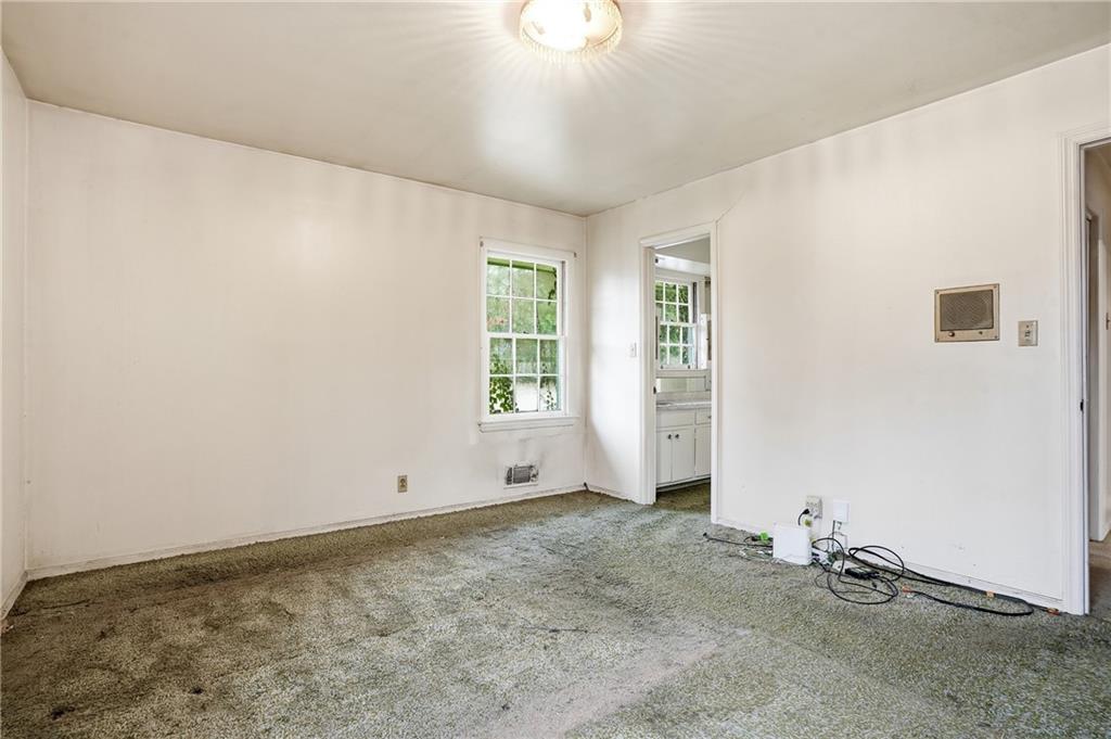 2935 Heather Drive East Point, GA 30344 - Photo 17 of 25 an empty room with windows