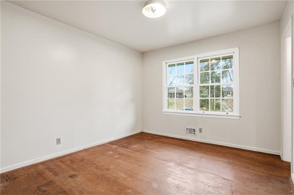 2935 Heather Drive East Point, GA 30344 - Photo 23 of 25 an empty room with a window