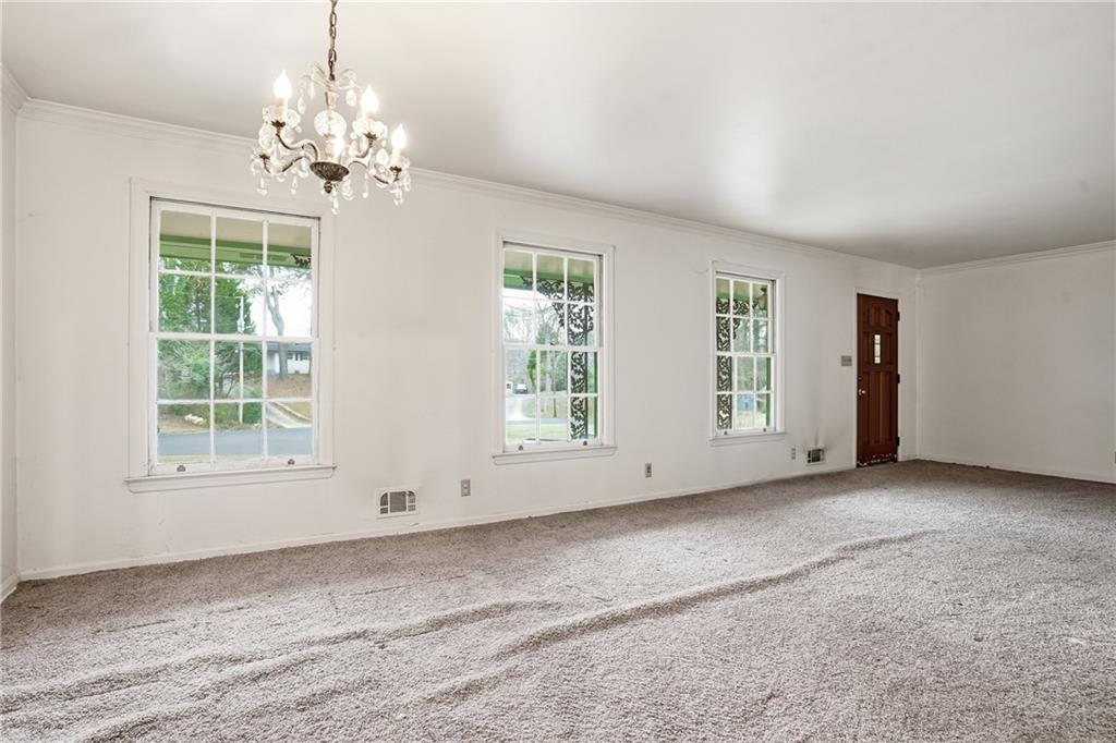 2935 Heather Drive East Point, GA 30344 - Photo 5 of 25 a view of an empty room with a window
