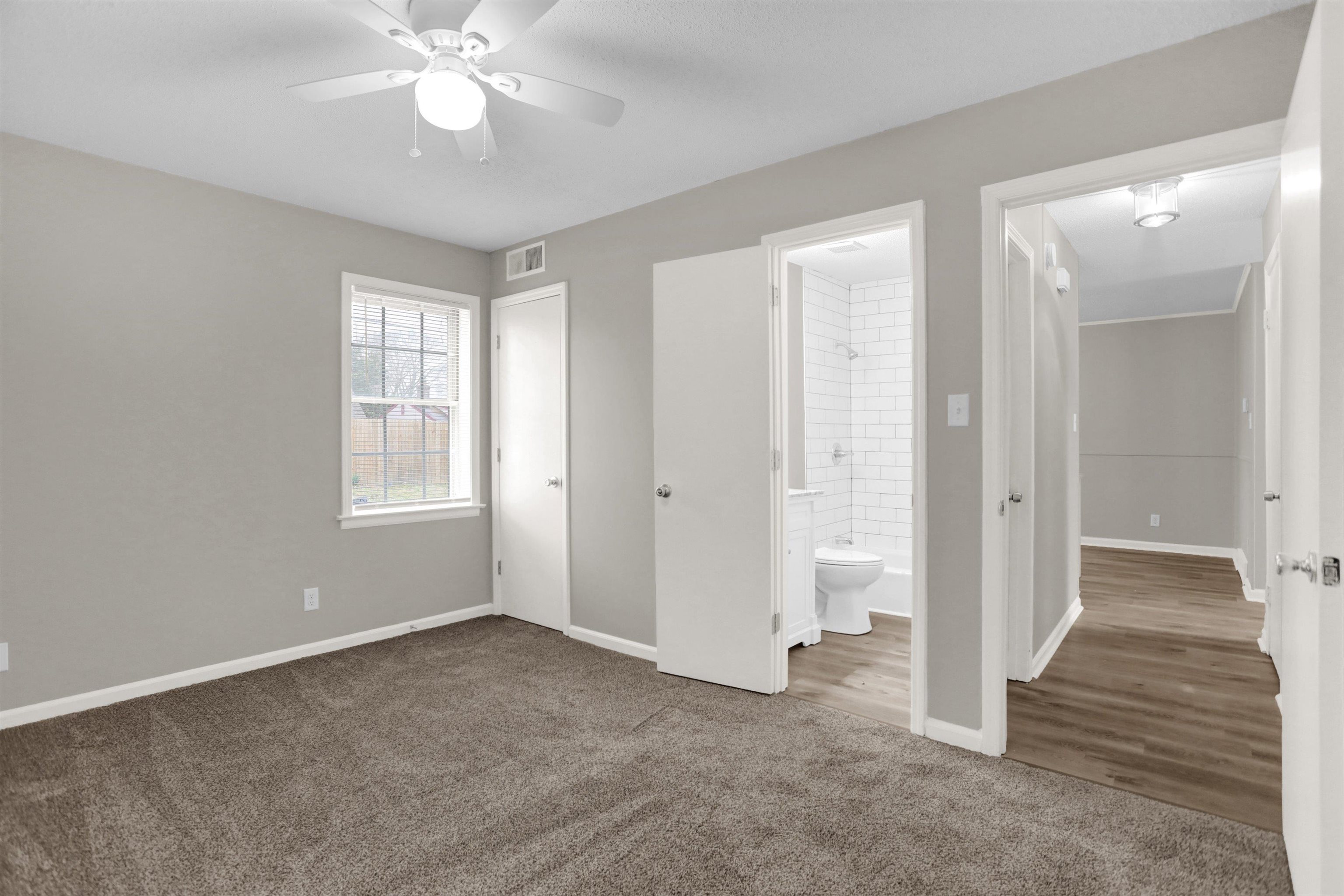 2853 Clearbrook Street Memphis, TN 38118 - Photo 17 of 30 Unfurnished bedroom featuring carpet floors, visible vents, connected bathroom, and baseboards