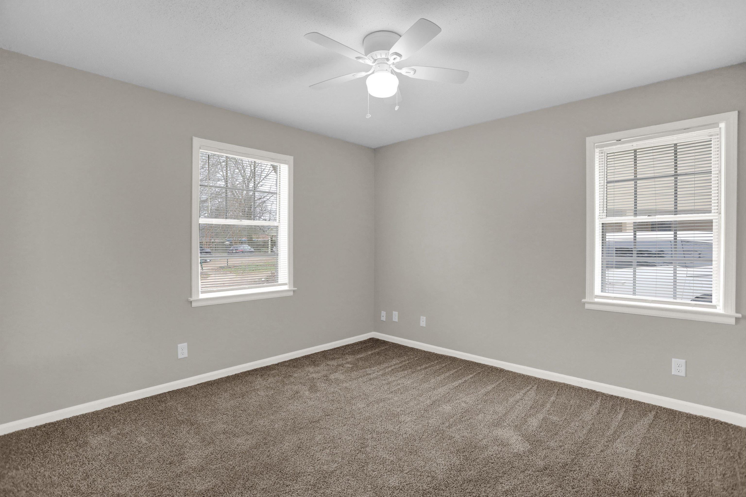 2853 Clearbrook Street Memphis, TN 38118 - Photo 19 of 30 Spare room with carpet floors, a ceiling fan, and baseboards