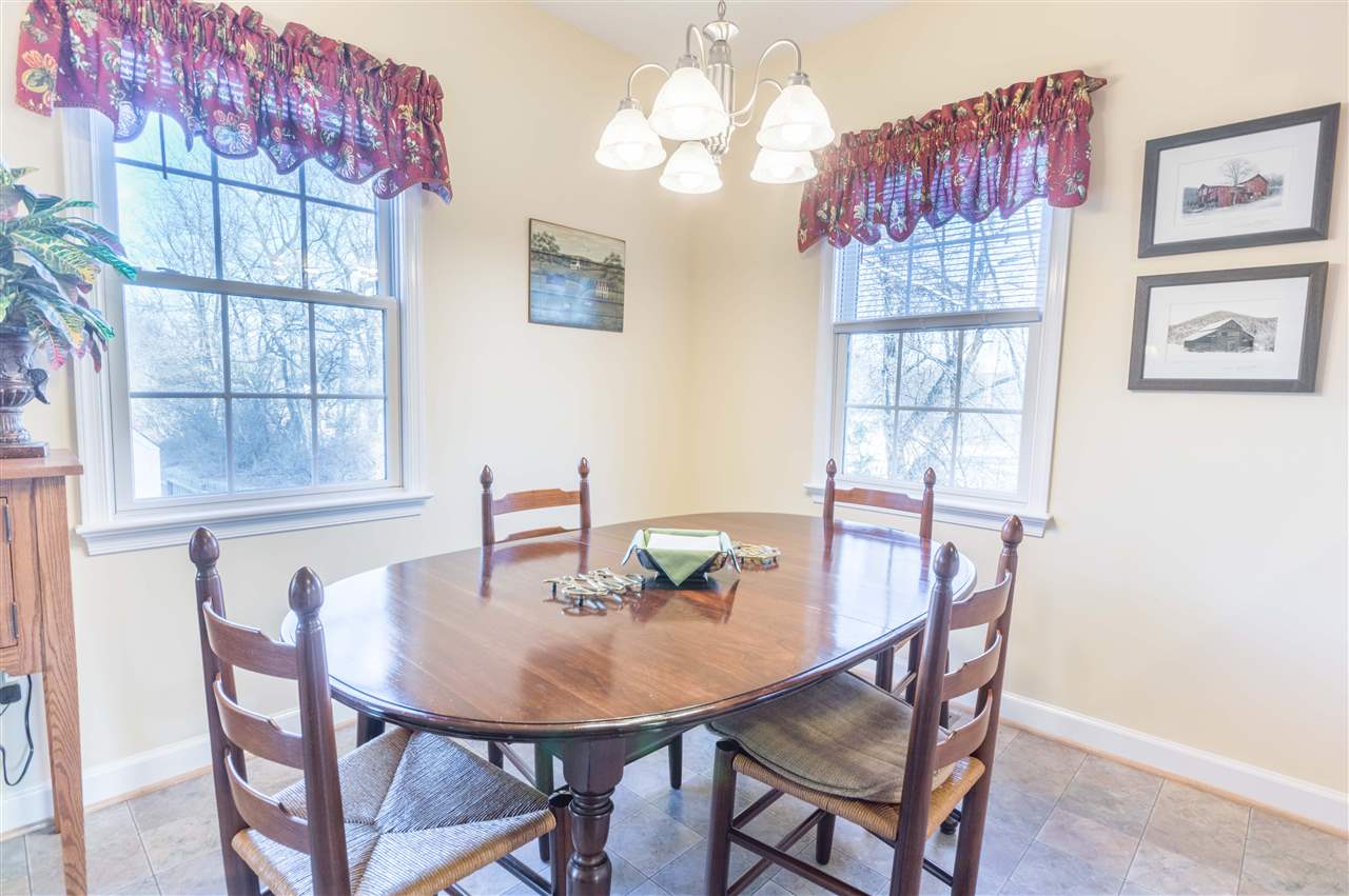 18 King Richard Road Waynesboro, VA 22980 - Photo 13 of 31 a view of a dining room with furniture and chandelier