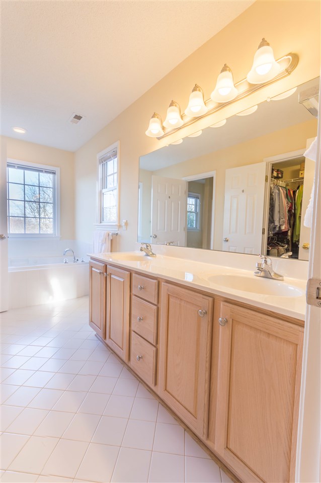 18 King Richard Road Waynesboro, VA 22980 - Photo 22 of 31 a spacious bathroom with a double vanity sink and a mirror