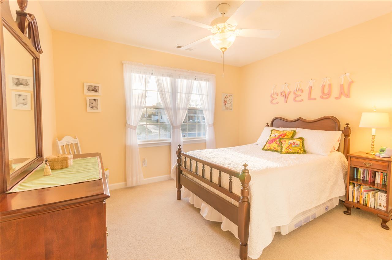 18 King Richard Road Waynesboro, VA 22980 - Photo 28 of 31 a bedroom with a bed and wooden floor