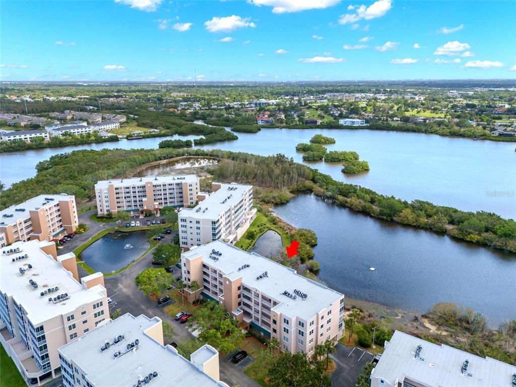 6475 Shoreline Drive, Unit 5403 St. Petersburg, FL 33708 - Photo 44 of 46 an aerial view of a city