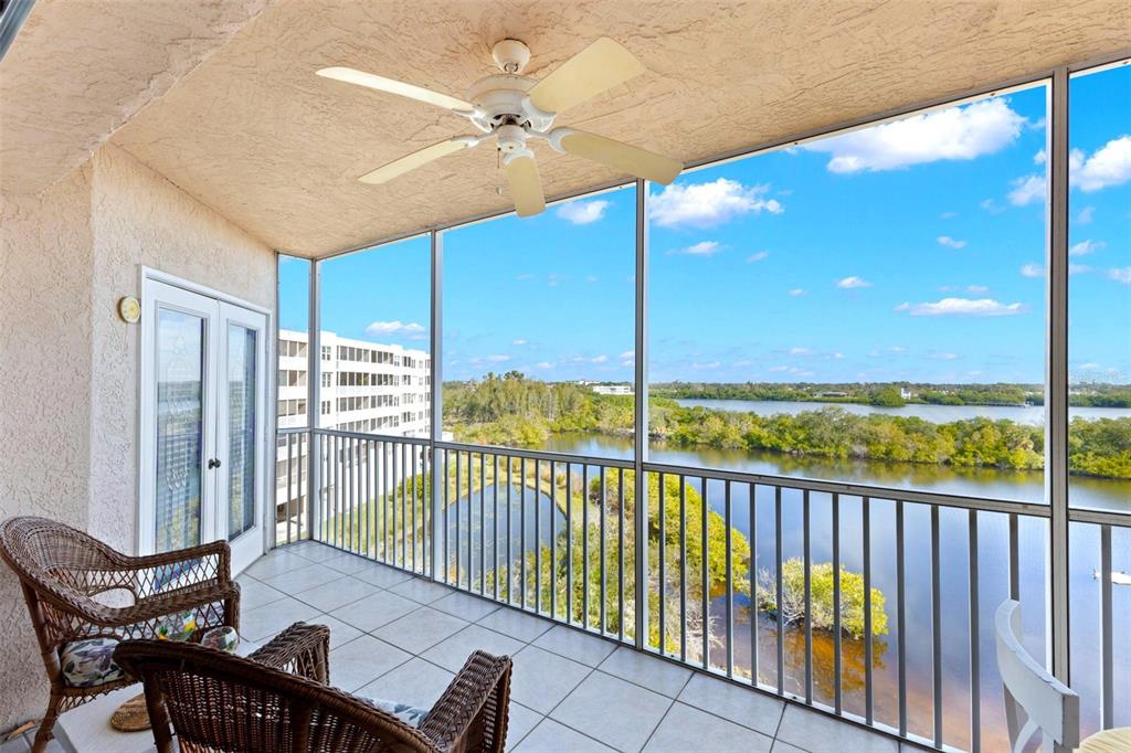 6475 Shoreline Drive, Unit 5403 St. Petersburg, FL 33708 - Photo 10 of 46 a view of a balcony with furniture