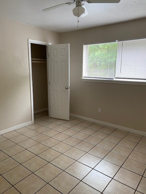 3206 Lobit Drive, Unit 42 Dickinson, TX 77539 - Photo 13 of 19 a view of an empty room with a window