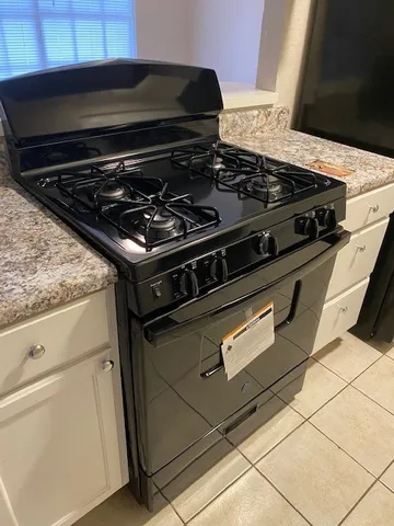 a close up of a stove top oven sitting on a counter