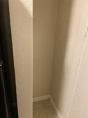 a bathroom with a sink and vanity