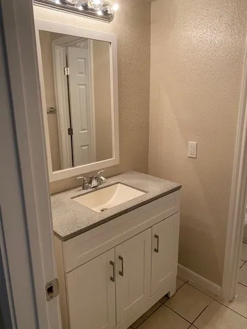 a bathroom with a bathtub and toilet