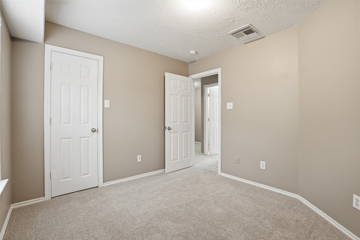 13084 Peppergate Lane Houston, TX 77044 - Photo 7 of 10 a view of an empty room