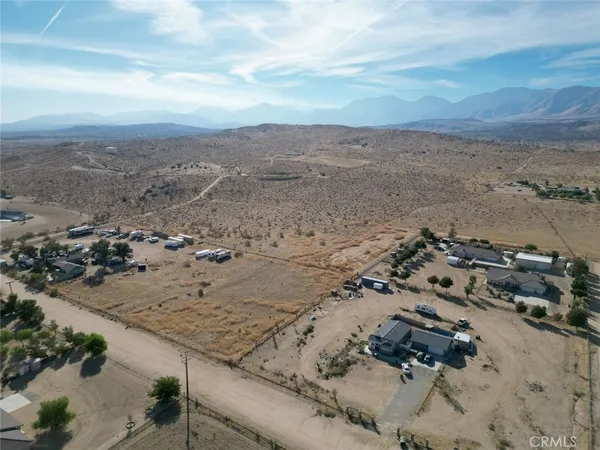 an aerial view of beach with beach